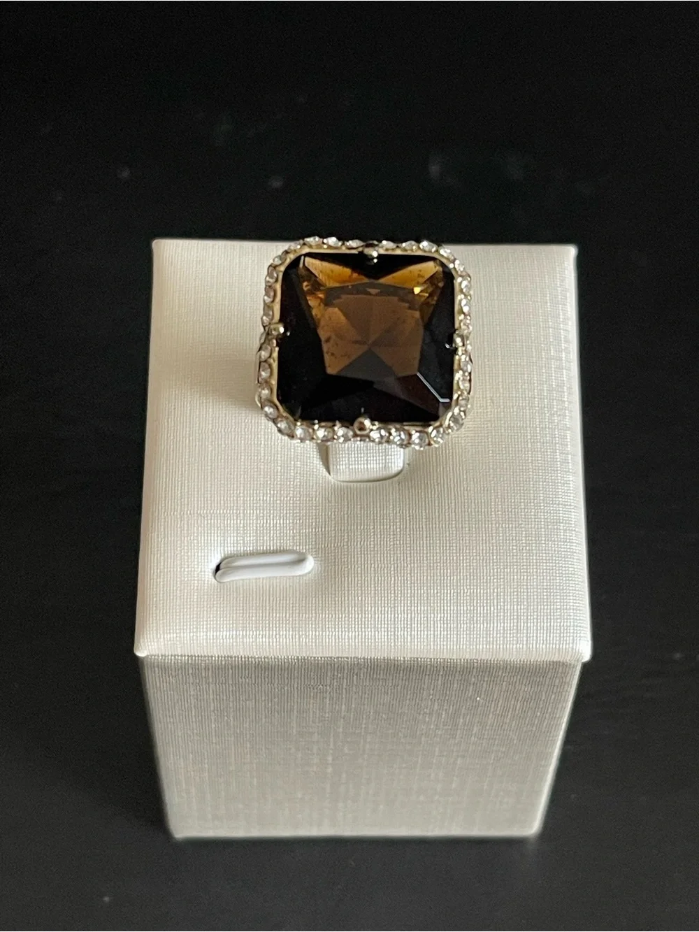 New gold tone simulated smoky quartz ring.